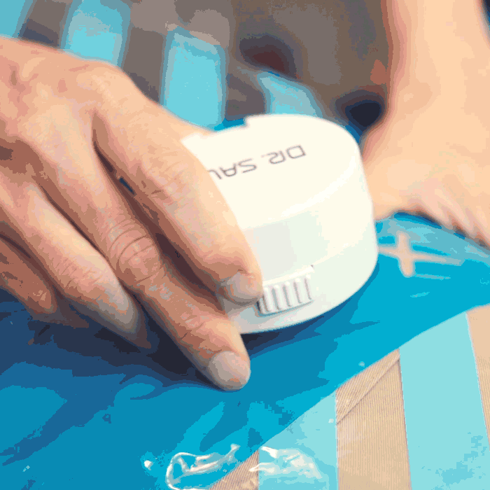 One-button operation of DR. SAVE DUO on a clothes vacuum bag